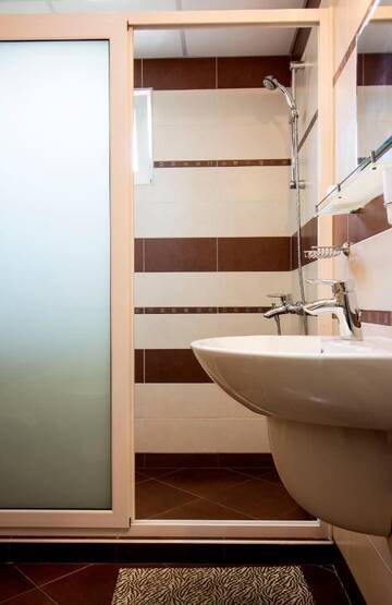Фото номера Апартаменты с 1 спальней и балконом (2 взрослых + 2 детей) Отель Ivatea Family Hotel г. Равда 2