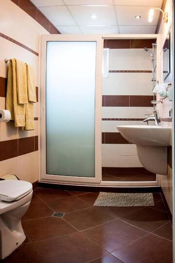 Фото номера Апартаменты с 1 спальней и балконом (2 взрослых + 2 детей) Отель Ivatea Family Hotel г. Равда 3