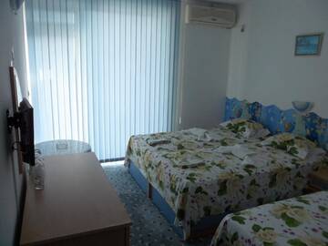 Фото номера Трехместный номер с собственной ванной комнатой Гостевой дом Sianie Guest House г. Равда 16