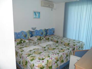 Фото номера Трехместный номер с собственной ванной комнатой Гостевой дом Sianie Guest House г. Равда 18