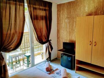 Фото номера Двухместный номер с 1 кроватью и террасой Гостевой дом Dracena Guesthouse г. Равда 3