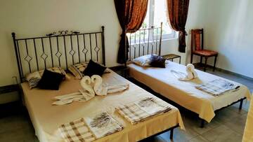 Фото номера Трехместный номер с террасой Гостевой дом Dracena Guesthouse г. Равда 2