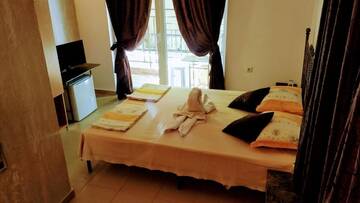 Фото номера Двухместный номер с 1 кроватью и террасой Гостевой дом Dracena Guesthouse г. Равда 6
