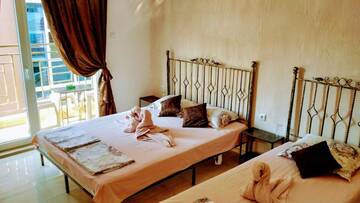 Фото номера Трехместный номер с террасой Гостевой дом Dracena Guesthouse г. Равда 2