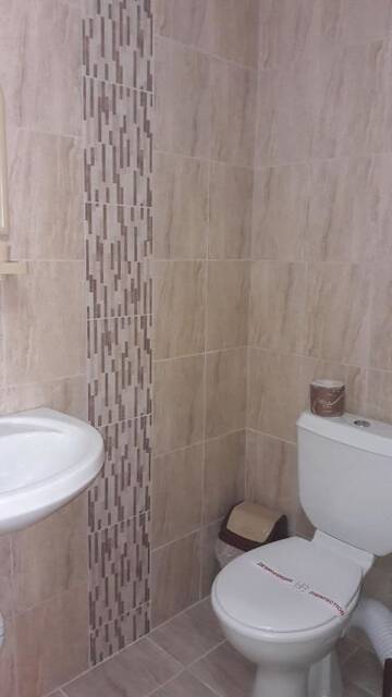 Фото номера Трехместный номер с террасой Гостевой дом Dracena Guesthouse г. Равда 7