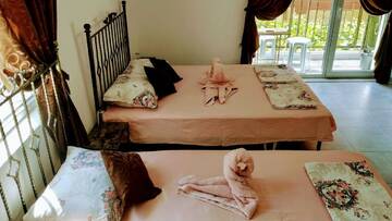 Фото номера Трехместный номер с террасой Гостевой дом Dracena Guesthouse г. Равда 4