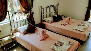 Фото номера Трехместный номер с террасой Гостевой дом Dracena Guesthouse г. Равда 3