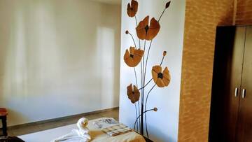 Фото номера Трехместный номер с террасой Гостевой дом Dracena Guesthouse г. Равда 4