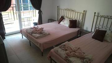 Фото номера Трехместный номер с террасой Гостевой дом Dracena Guesthouse г. Равда 4