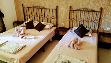 Фото номера Трехместный номер с террасой Гостевой дом Dracena Guesthouse г. Равда 6