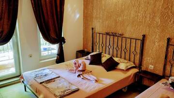 Фото номера Трехместный номер с террасой Гостевой дом Dracena Guesthouse г. Равда 2