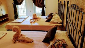 Фото номера Трехместный номер с террасой Гостевой дом Dracena Guesthouse г. Равда 4