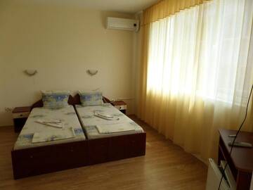 Фото номера Двухместный номер с 1 кроватью Отель Guesthouse Iceberg г. Равда 4