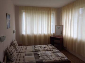 Фото номера Четырехместный номер Отель Guesthouse Iceberg г. Равда 10