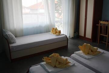 Фото номера Трехместный номер Гостевой дом Zoya Guest House г. Равда 18