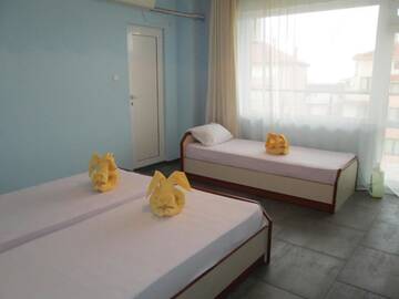 Фото номера Трехместный номер Гостевой дом Zoya Guest House г. Равда 24