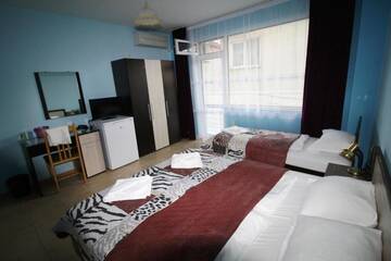 Фото номера Трехместный номер Гостевой дом Zoya Guest House г. Равда 27
