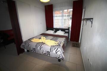 Фото номера Номер-студио Делюкс Гостевой дом Zoya Guest House г. Равда 6