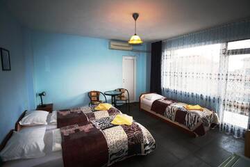 Фото номера Трехместный номер Гостевой дом Zoya Guest House г. Равда 32